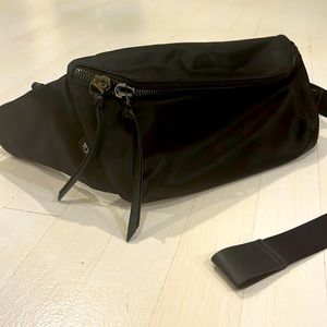 Brand new TUMI waistpack. Otherwise known as a Fanny pack!